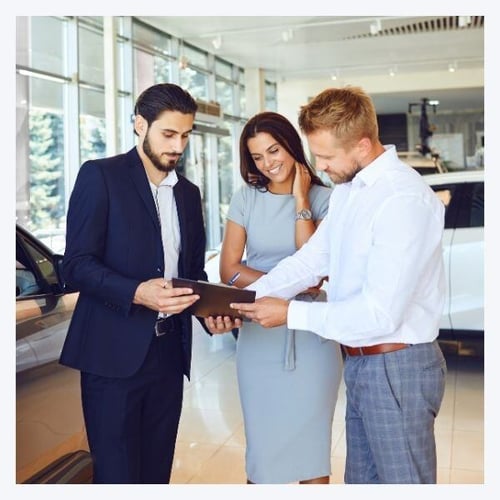 A couple buying a car